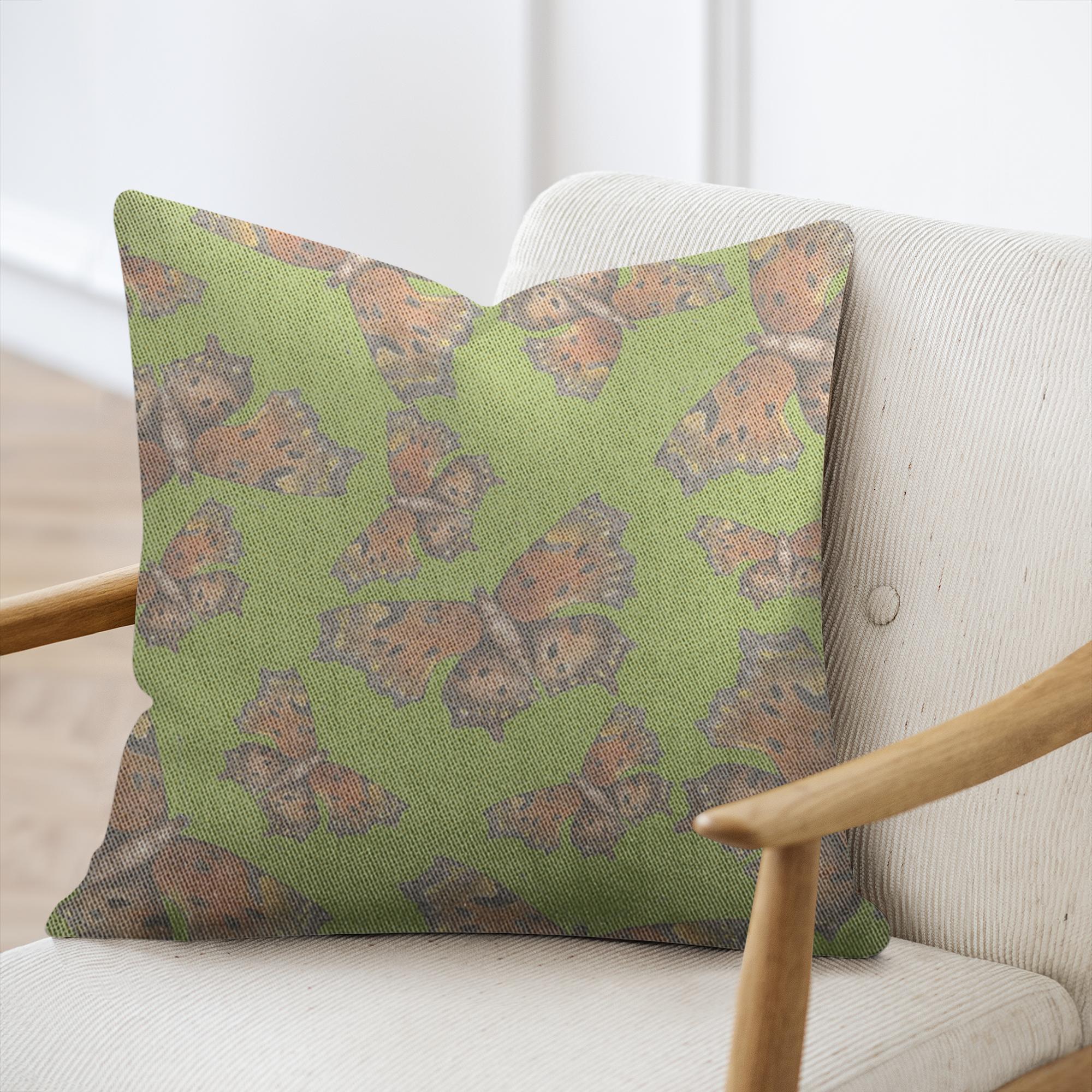 Cotton/poly blend woven pillow green coma butterfly pattern