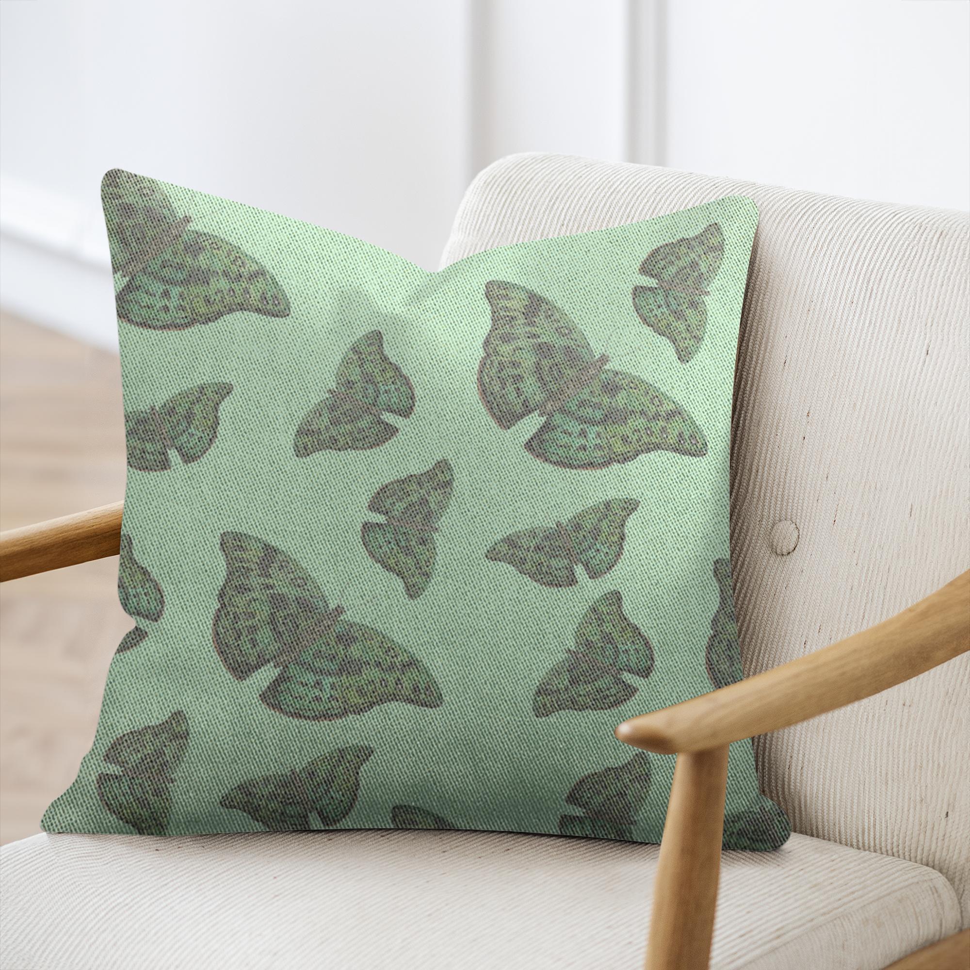 Cotton/poly blend woven pillow green african butterfly pattern