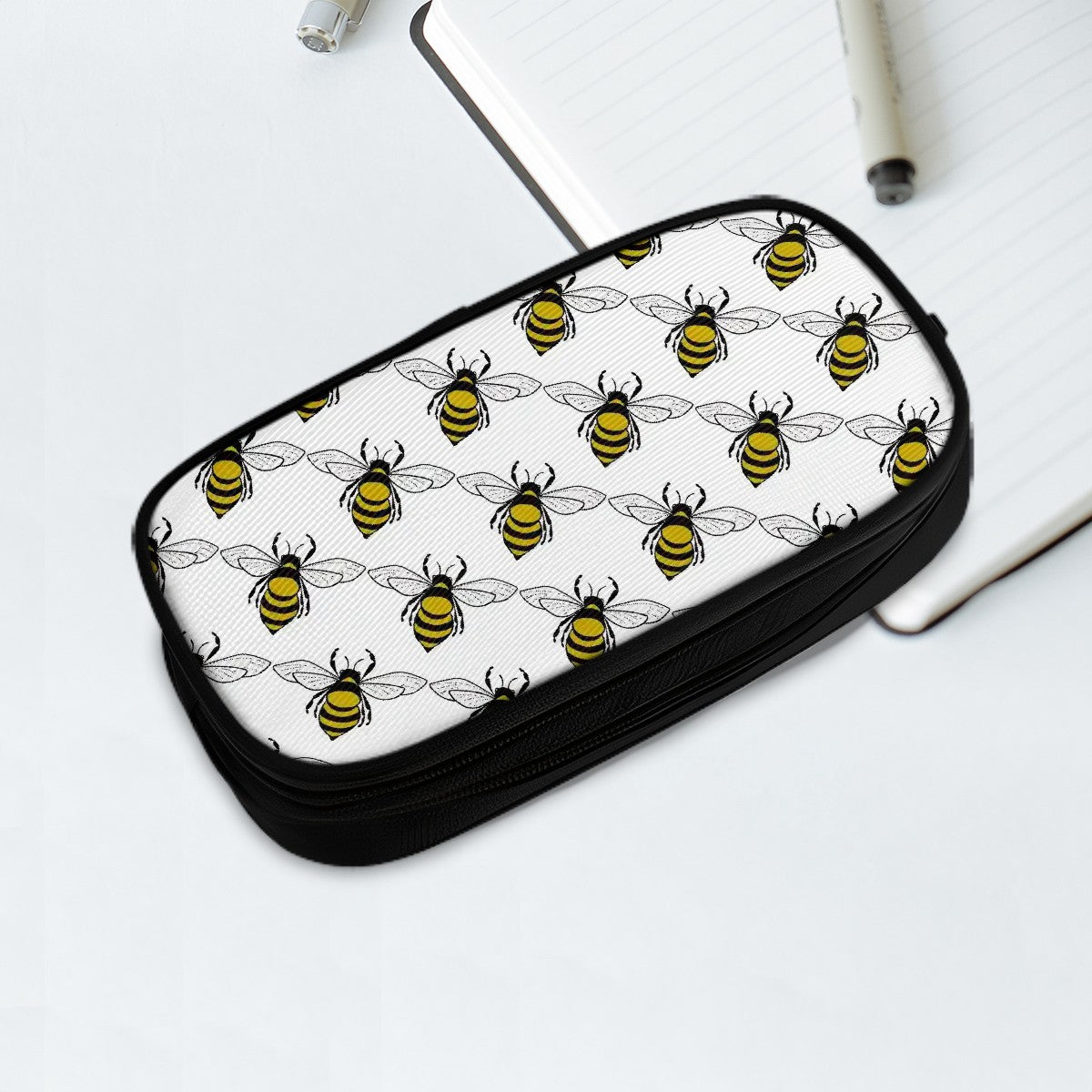 Zippered pencil pouch with multiple pouches honey bee pattern black