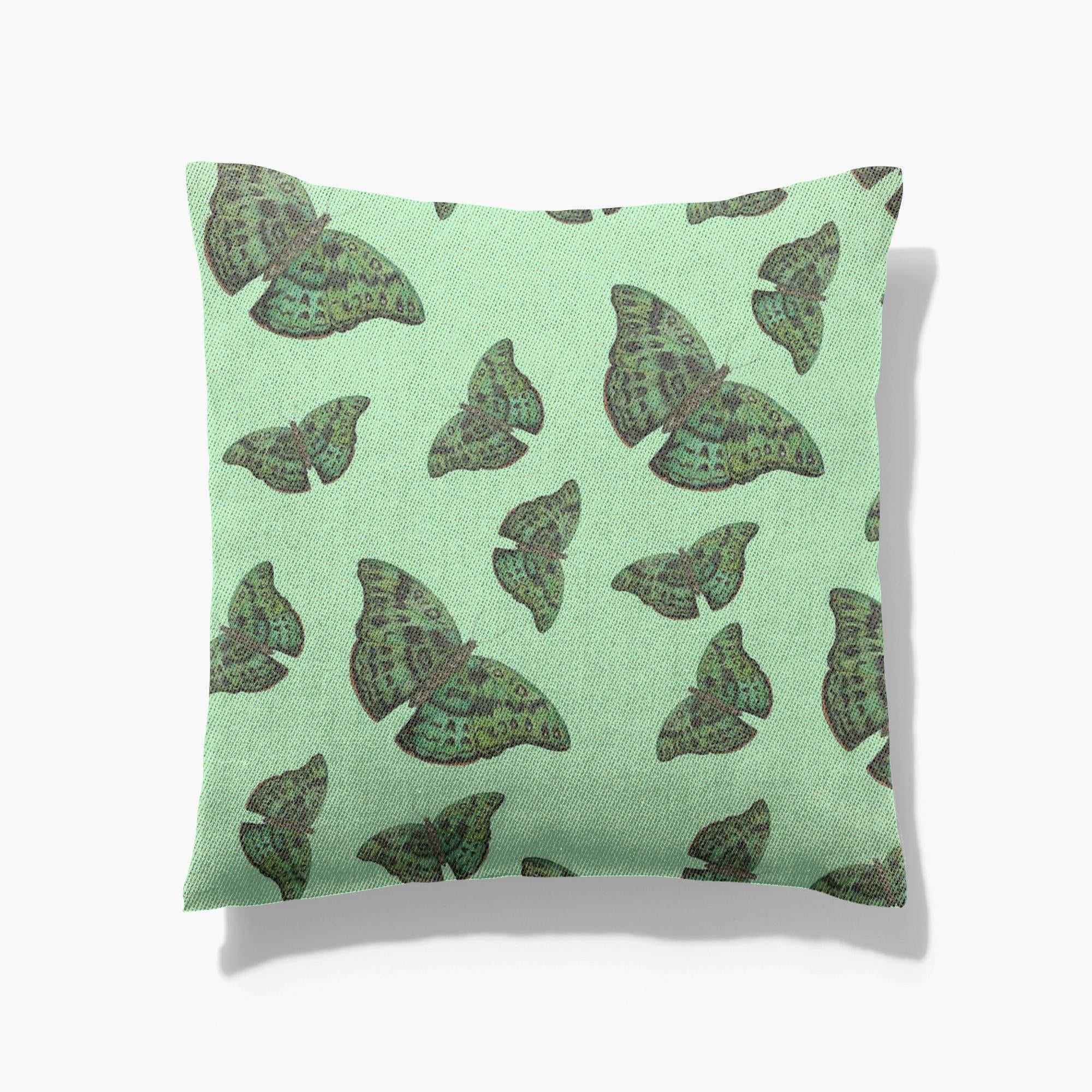 Cotton/poly blend woven pillow green african butterfly pattern