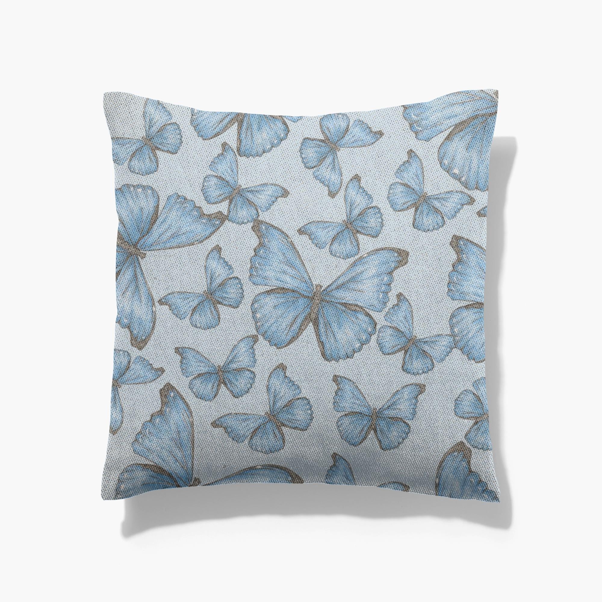 Cotton/poly blend woven pillow cramer’s blue morpho butterfly pattern