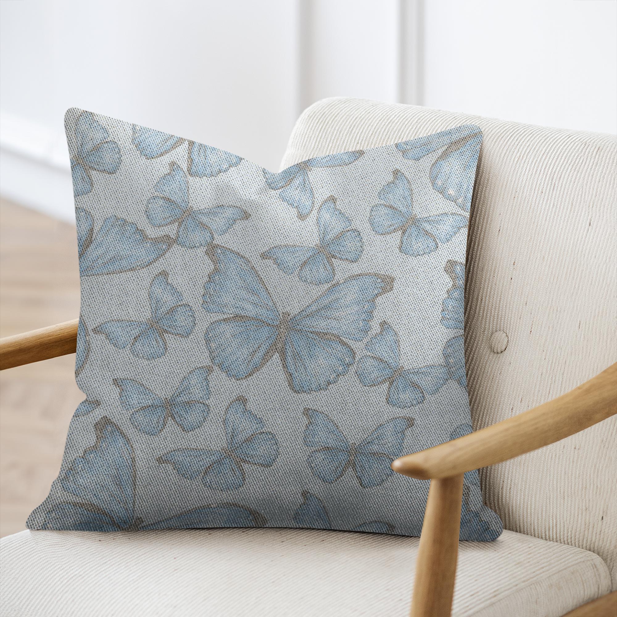 Cotton/poly blend woven pillow cramer’s blue morpho butterfly pattern