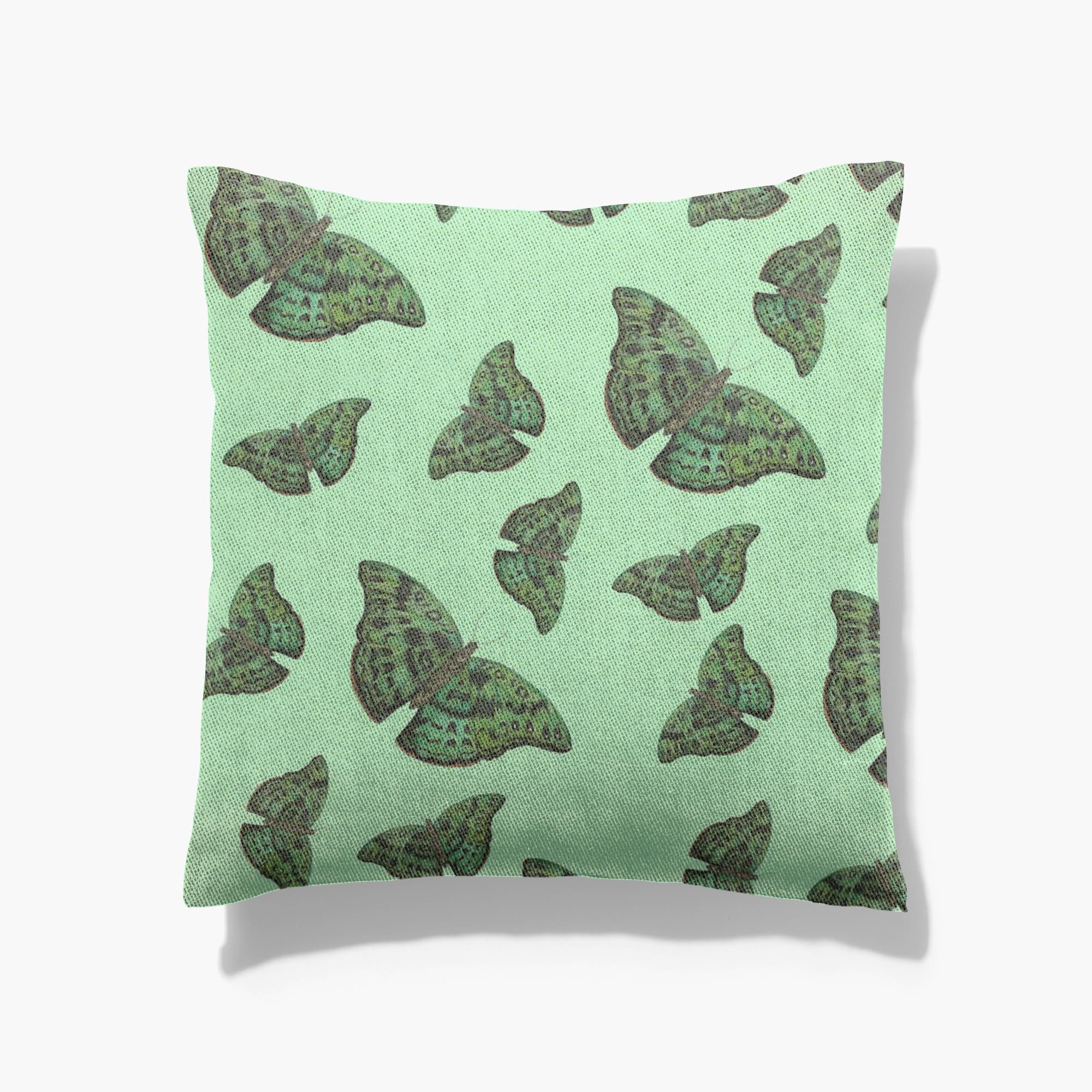 Cotton/poly blend woven pillow green african butterfly pattern