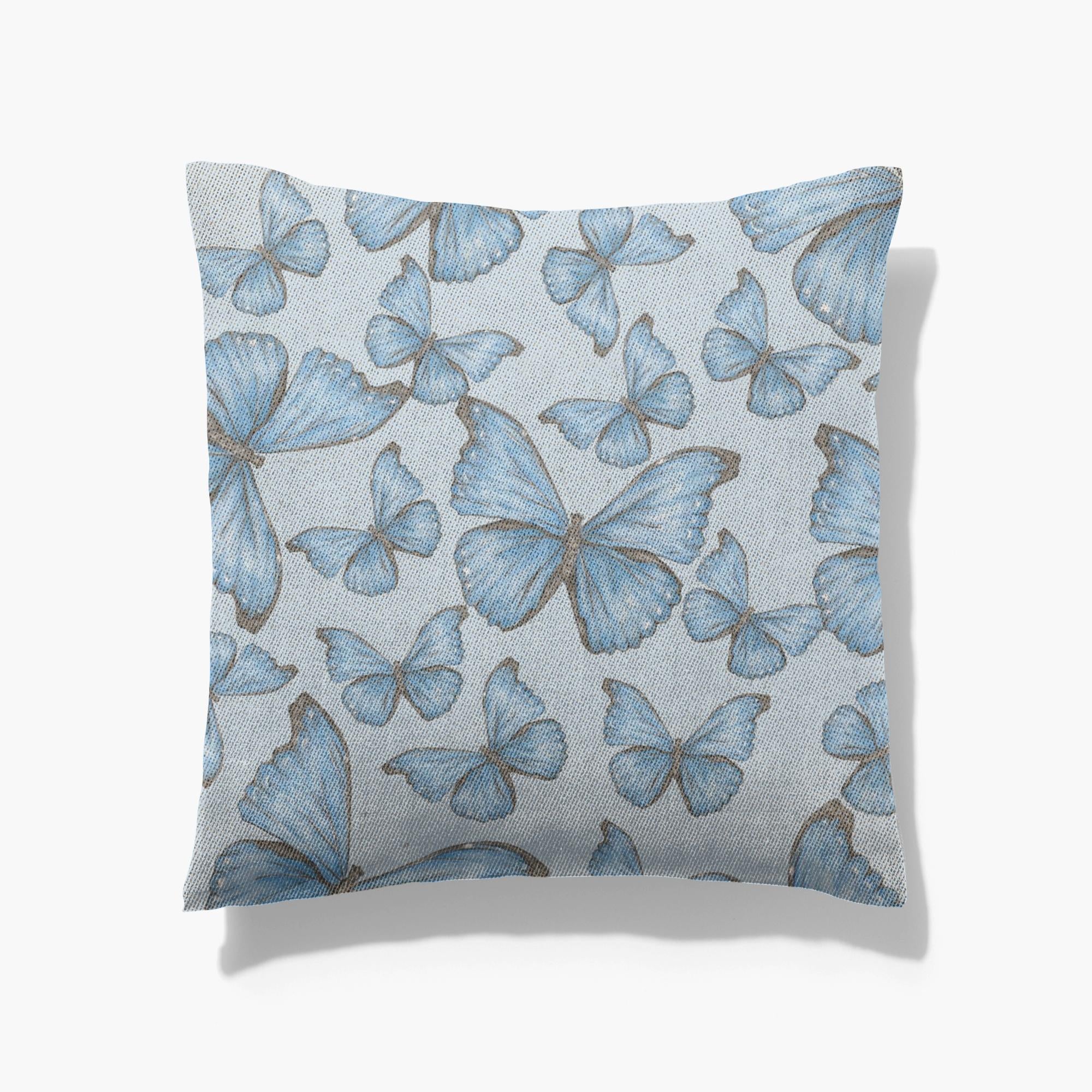 Cotton/poly blend woven pillow cramer’s blue morpho butterfly pattern